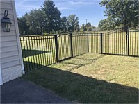 <b>3 Rail Canterbury flush bottom black aluminum fence with single walk gate with arch</b>